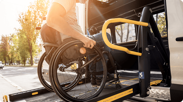 MediDrive driver assisting a member who uses a wheelchair